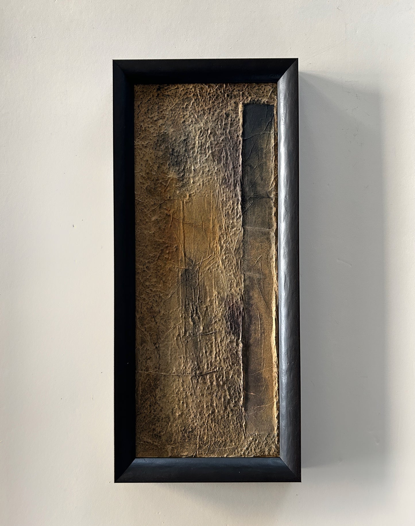 Framed abstract artwork inspired by Norse markings, featuring textured layers, earthy tones, and a raw yet sophisticated design. A unique one-of-a-kind piece that captures the essence of nature and ancient craftmanship.