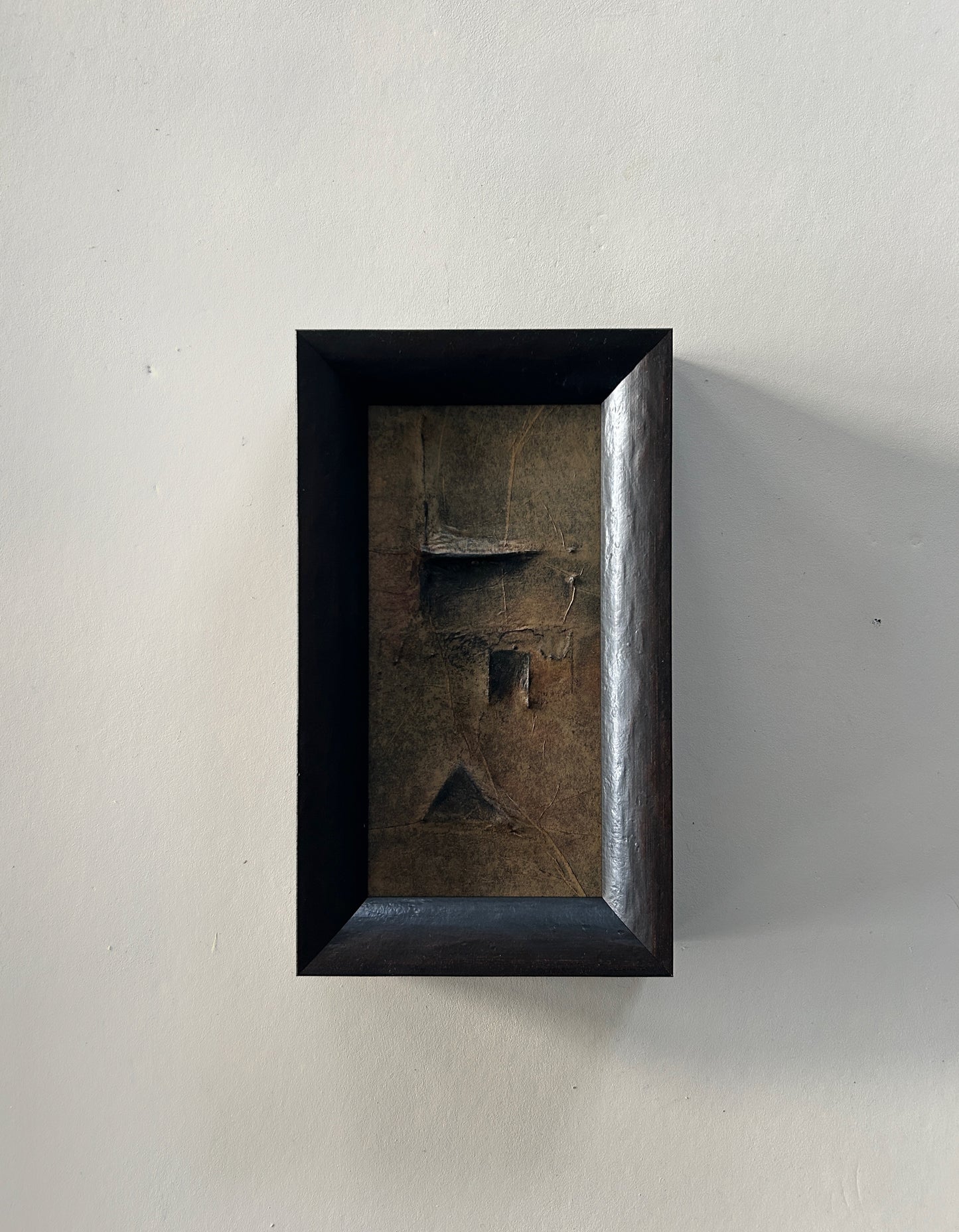 Framed abstract artwork inspired by Norse markings, featuring textured layers, earthy tones, and a raw yet sophisticated design. A unique one-of-a-kind piece that captures the essence of nature and ancient craftmanship.