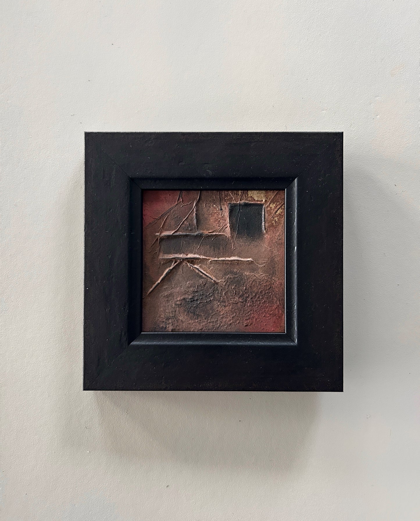 Framed abstract artwork inspired by Norse markings, featuring textured layers, earthy tones, and a raw yet sophisticated design. A unique one-of-a-kind piece that captures the essence of nature and ancient craftmanship.