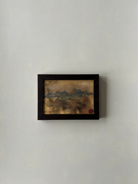 Framed abstract landscape artwork, inspired by japanese ink art, created with ink, charcoal and paper techniques. Encased in a walnut-style frame with a red wax stamp signature, blending traditional craftmanship with modern aesthetics